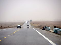 05 Paved Highway With Industrial Complex Ahead On The Way From Kashgar To Yarkand